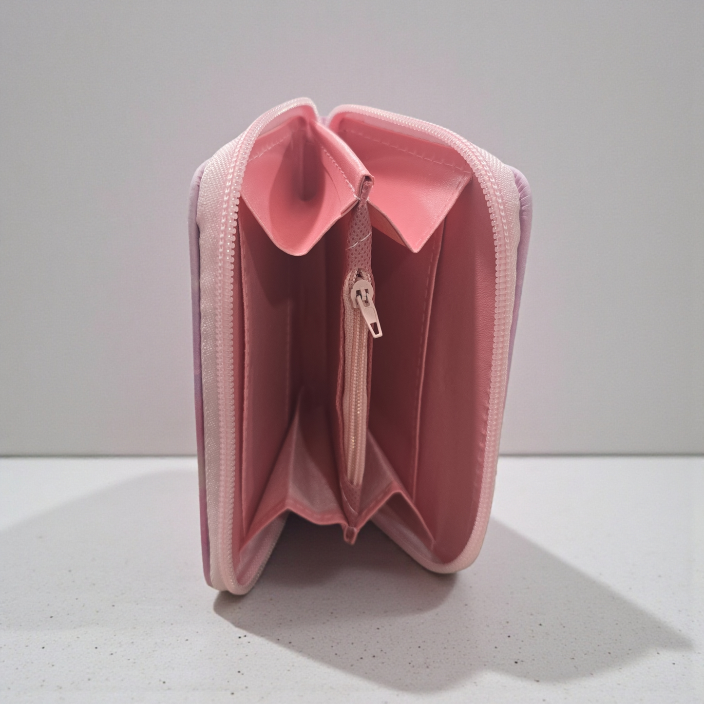 Huntrix" K-pop demon hunter girl group themed wallet featuring the characters Rumi, Mira, and Zoey.