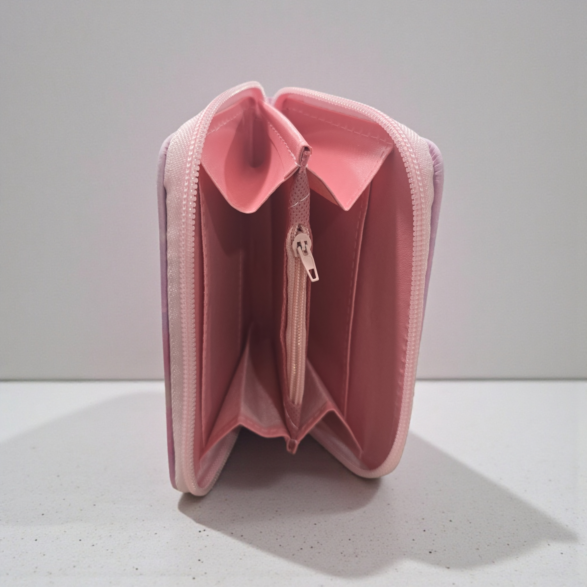 Huntrix" K-pop demon hunter girl group themed wallet featuring the characters Rumi, Mira, and Zoey.