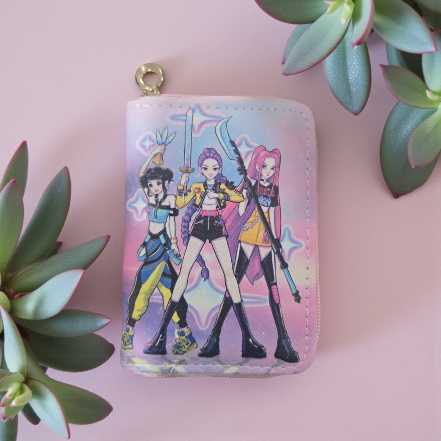 Huntrix" K-pop demon hunter girl group themed wallet featuring the characters Rumi, Mira, and Zoey.