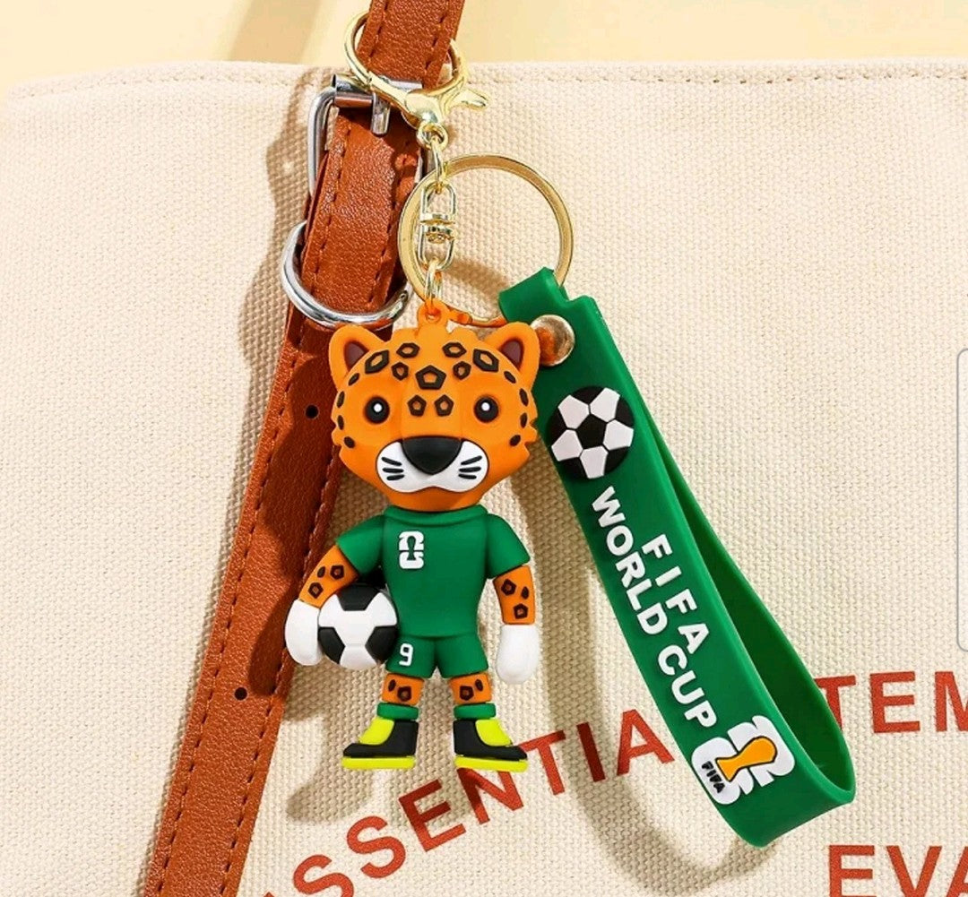 FIFA World Cup 2026 mascot keychain features a cartoon jaguar, commonly identified as Zayu, the mascot representing Mexico.