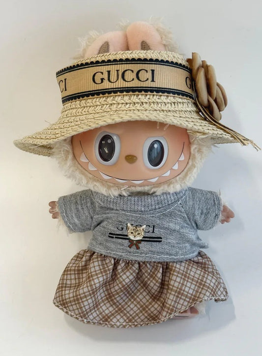 Labubu GG inspired straw hat and sweater set with plaid skirt.