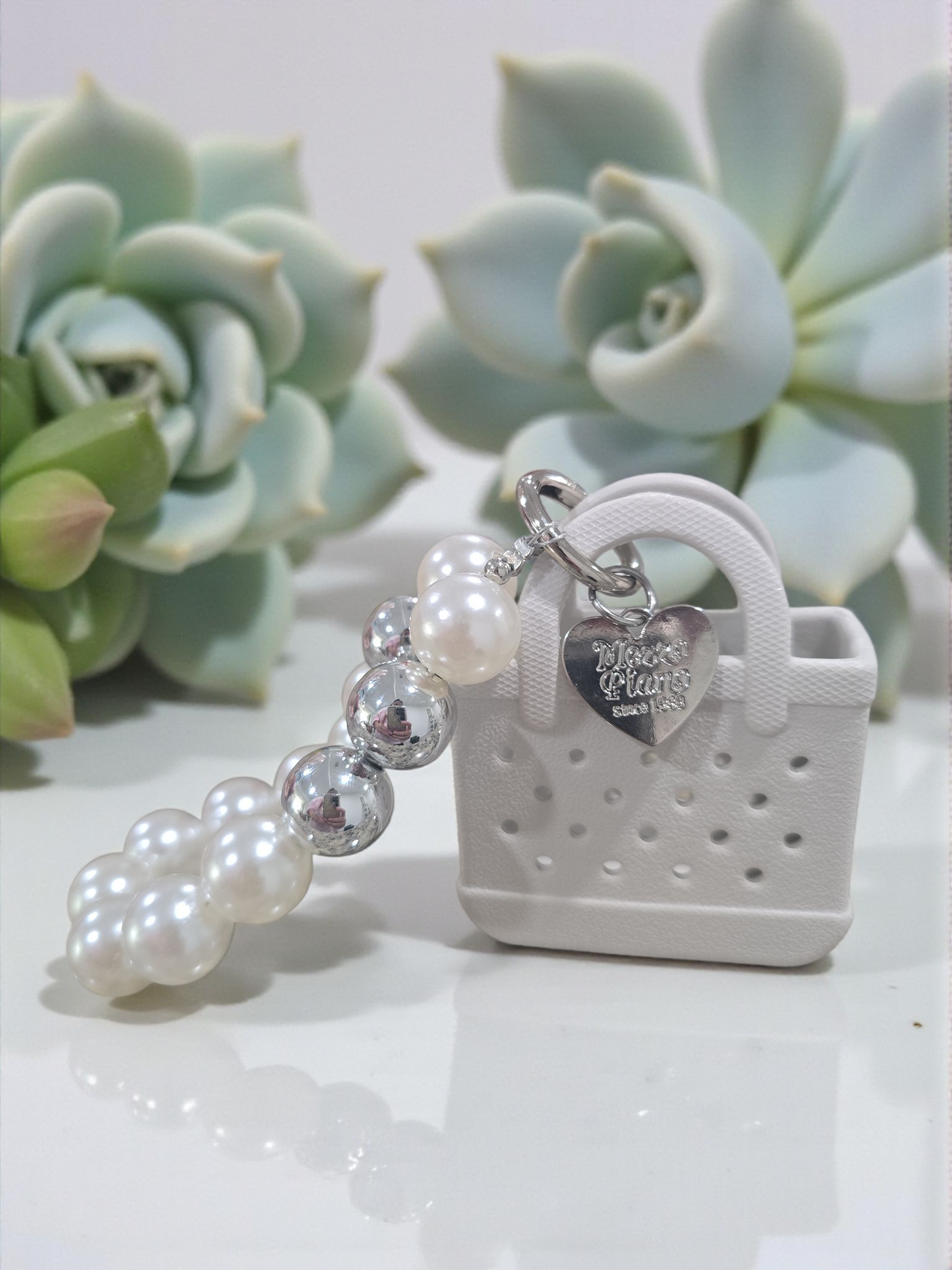 Beaded charm keychain with a cartoon animal decoration little bag