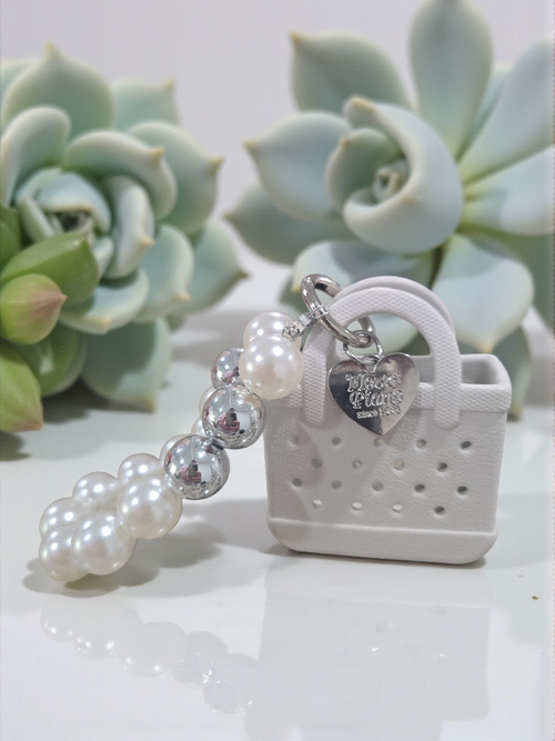 Beaded charm keychain with a cartoon animal decoration little bag